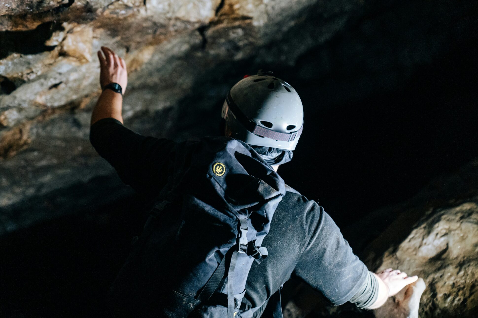 Person in a confined space climbing